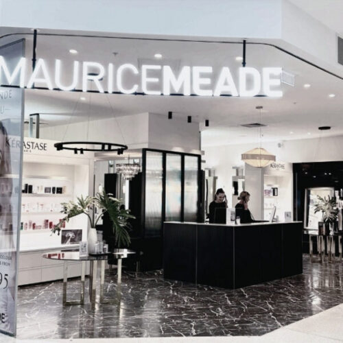 Maurice Meade store front with elegant displays and welcoming atmosphere.