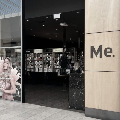 Maurice Meade store entrance showcasing the Kerastase product display.